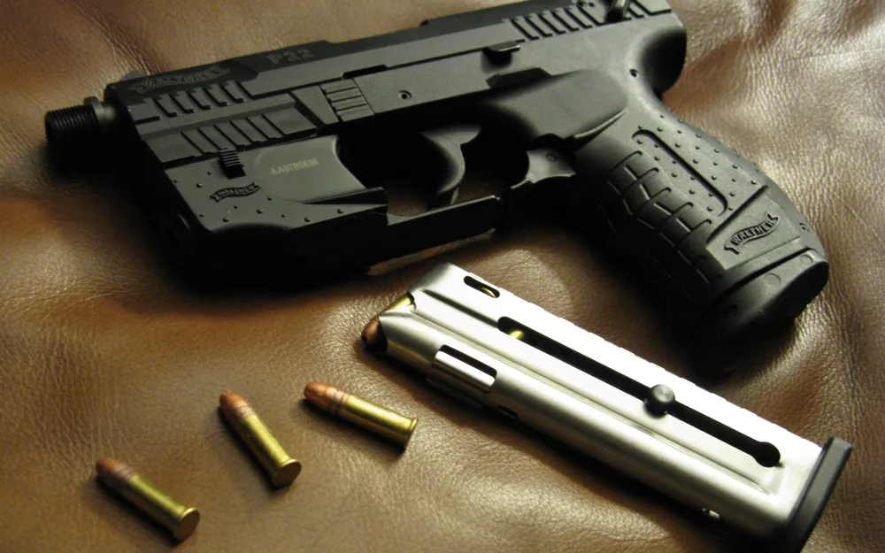 Manually crop Gun, Weapon wallpaper to 2560x1440 resolution to your desktop