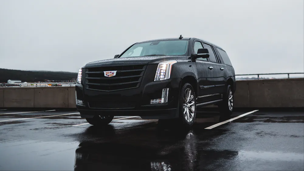 Обои Cadillac Escalade 1080x1920
